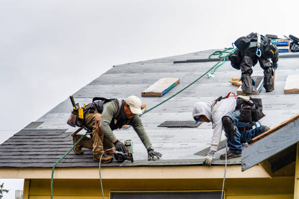 Professional Roofing technician working in Old Bethpage, NY